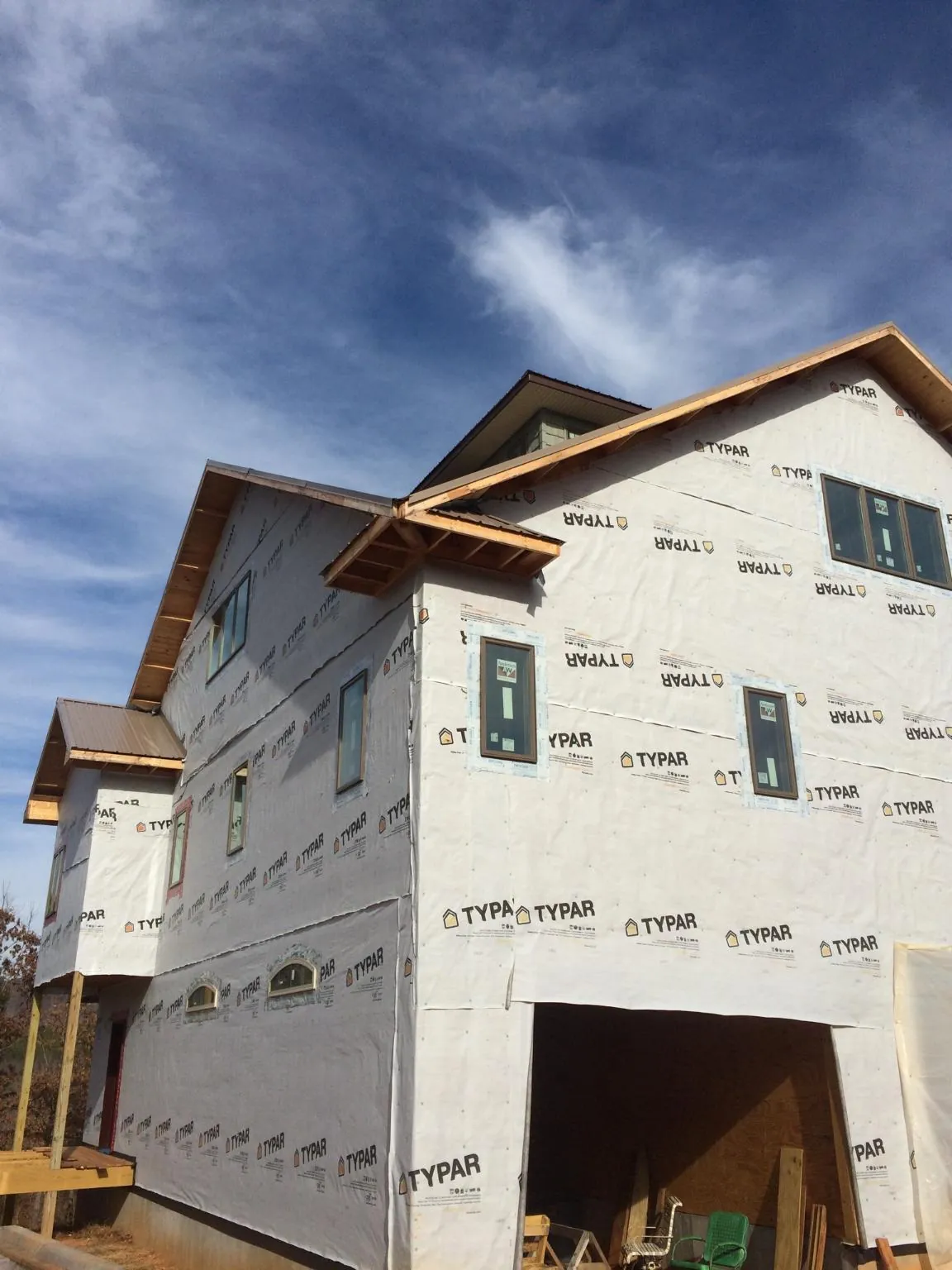 Stick built house wrapped in Typar with new roof framing and dormers in Poestenkill